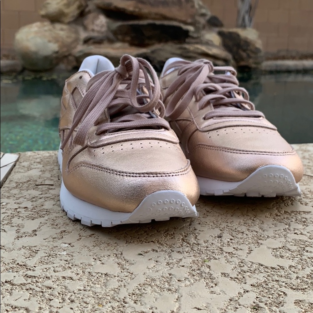 Rose gold reebok shoes